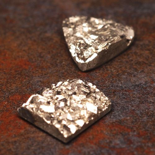 Pyrite cabochons assists in reseting wealth and abundance within the home